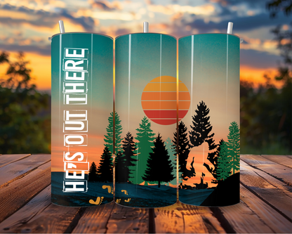 20oz He’s Out There Skinny Tumbler – Bigfoot Silhouette Sunset Design